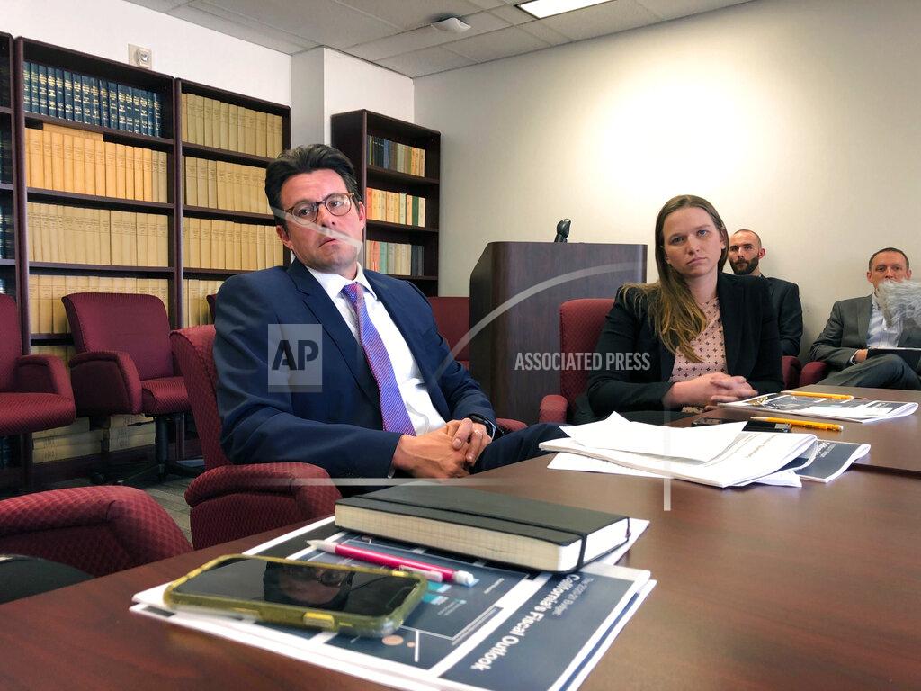 California Legislative Analyst Gabriel Petek, left, and Principal Fiscal and Policy Analyst Ann Hollingshead speak with reporters on Wednesday, Nov. 20, 2019, in Sacramento, Calif. The nonpartisan Legislative Analyst's Office on Wednesday predicted California will have a $7 billion surplus next year. (AP Photo/Adam Beam)