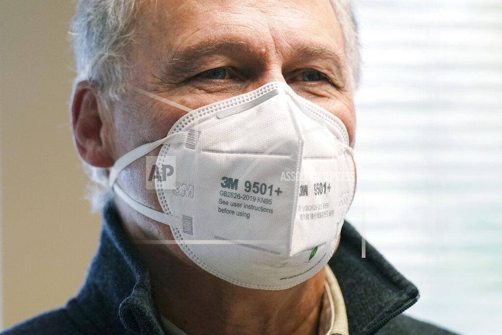 Ted S. Warren Washington Gov. Jay Inslee wears a mask as he waits to be given the first shot of the Moderna COVID-19 vaccine, Friday, Jan. 22, 2021, at a Sea-Mar Community Health Center in Olympia, Wash. (AP Photo/Ted S. Warren)