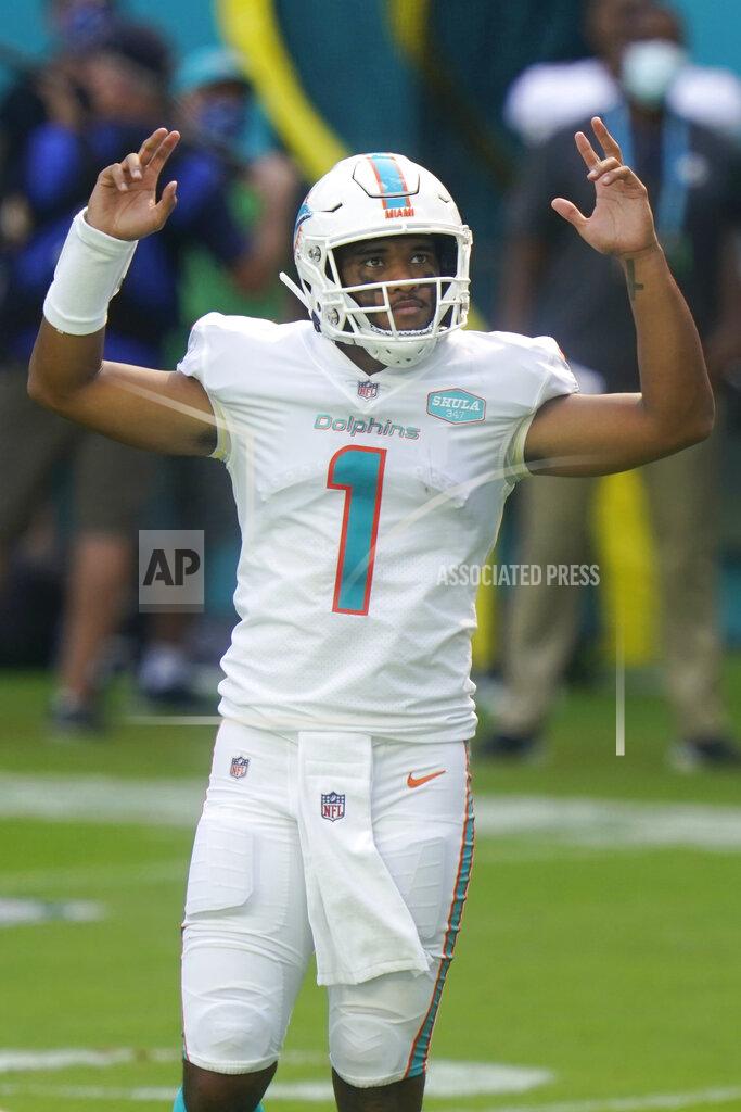 Lynne Sladky Miami Dolphins quarterback Tua Tagovailoa (1) gestures during the first half of an NFL football game against the Los Angeles Rams, Sunday, Nov. 1, 2020, in Miami Gardens, Fla. (AP Photo/Lynne Sladky)
