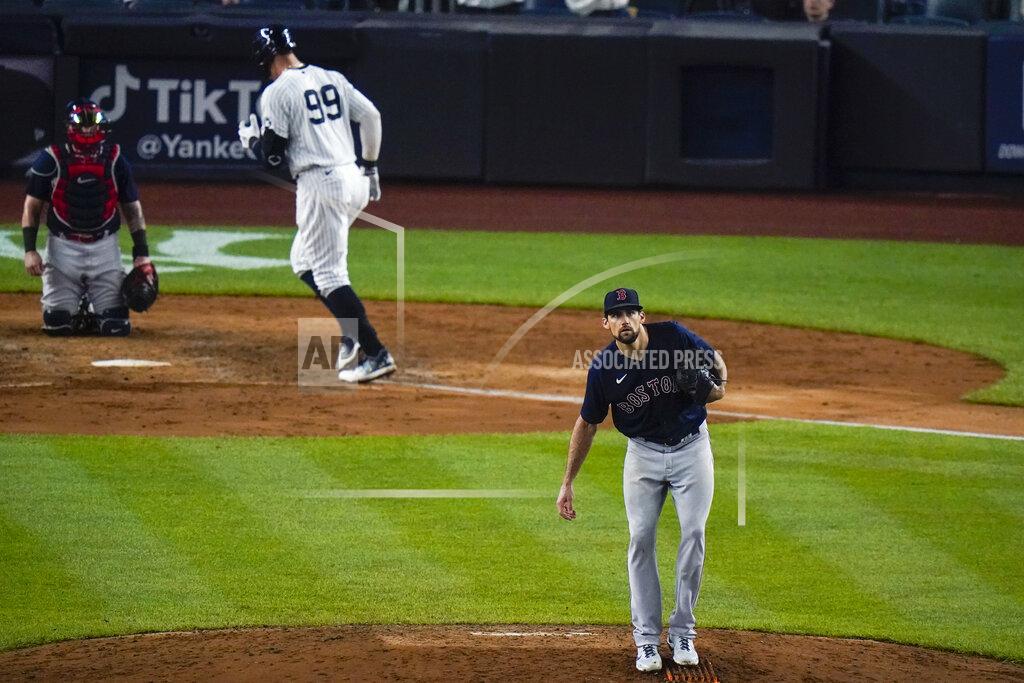 Frank Franklin Ii Boston Red Sox starting pitcher Nathan Eovaldi, right, reacts as New York Yankees' Aaron Judge (99) runs the bases after hitting a home run during the sixth inning of a baseball game Friday, June 4, 2021, in New York. (AP Photo/Frank Franklin II)
