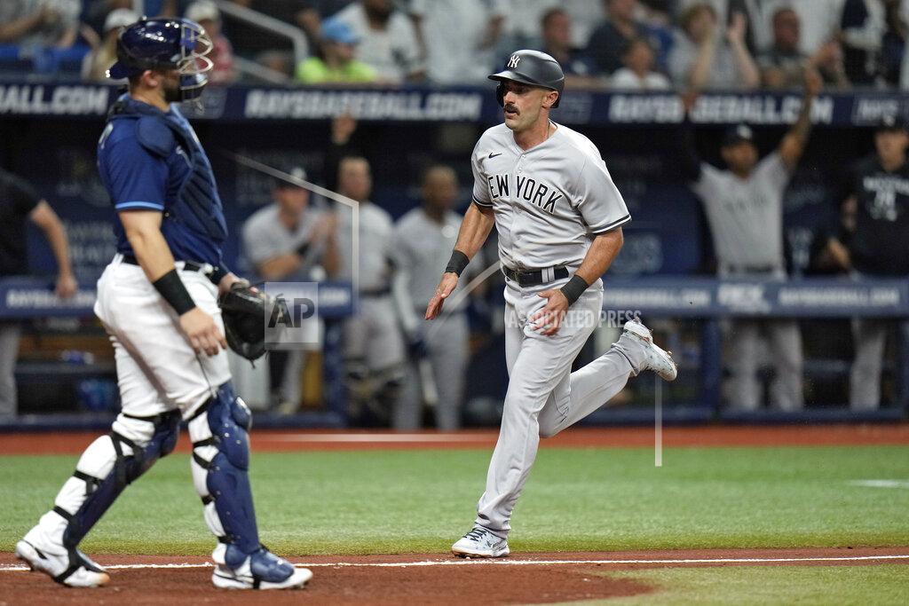 Chris O'MEara New York Yankees' Matt Carpenter, right, scores in front of Tampa Bay Rays catcher Mike Zunino on an RBI single by Aaron Judge during the sixth inning of a baseball game Thursday, May 26, 2022, in St. Petersburg, Fla. (AP Photo/Chris O'Meara)