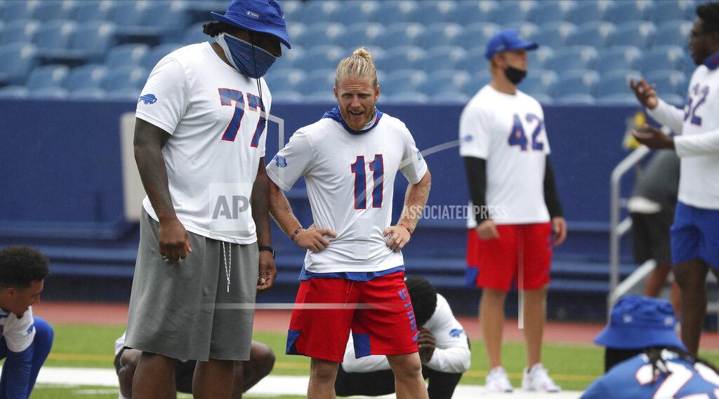 James P. Mccoy Buffalo Bills offensive tackle Ty Nsekhe (77) and Buffalo Bills wide receiver Cole Beasley (11) stretch in warm-ups at practice today at Bills Stadium in Orchard Park, N.Y. on Wednesday, Sept. 2, 2020. (James P. McCoy / Buffalo News, Pool)