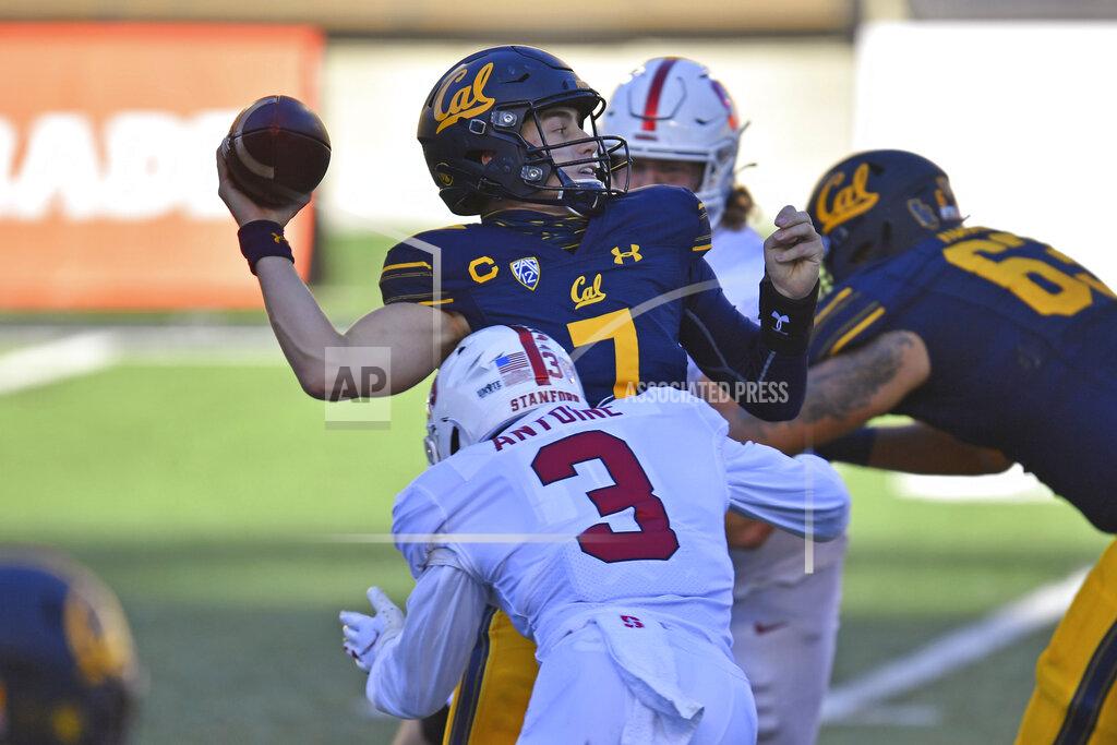 Jose Carlos Fajardo California quarterback Chase Garbers (7) is sacked by Stanford's Malik Antoine (3) during the second quarter of an NCAA college football game Friday, Nov. 27, 2020, in Berkeley, Calif. (Jose Carlos Fajardo/Bay Area News Group via AP)