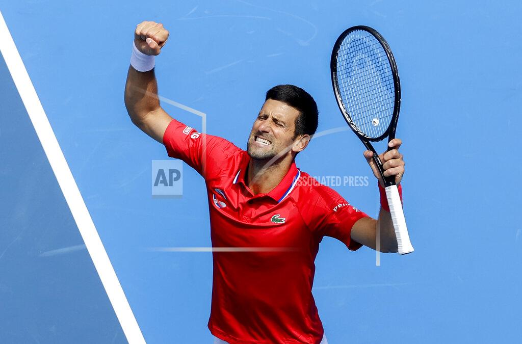 Hamish Blair Serbia's Novak Djokovic celebrates after defeating Canada's Denis Shapovalov in their ATP Cup match in Melbourne, Australia, Tuesday, Feb. 2, 2021. (AP Photo/Hamish Blair)