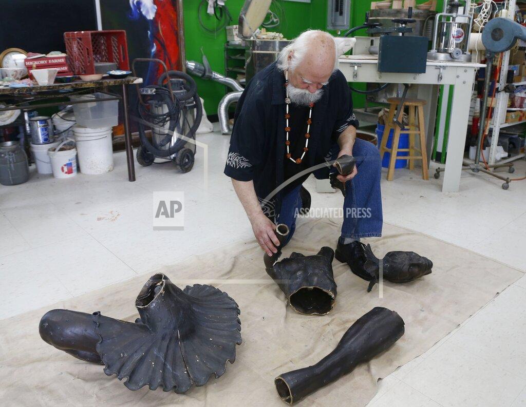 Stephen Pingry Sculptor Gary Henson, who made the Marjorie Tallchief statue that was stolen from the Tulsa Historical Society and cutup for scrap metal, shows the parts which he will reassemble at the Boys and Girls Club in Chelsea, Okla., on Monday, May 9, 2022. (Stephen Pingry/Tulsa World via AP)