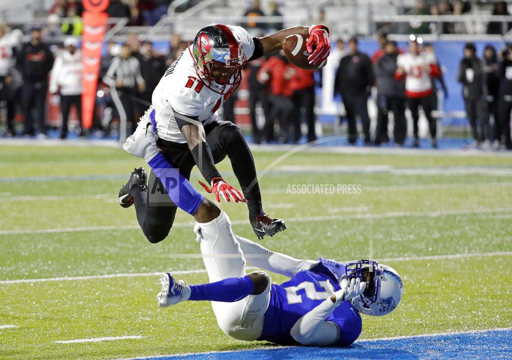 Mark Humphrey Western Kentucky wide receiver Lucky Jackson (11) leaps over Middle Tennessee defensive back Chris Stamps (2) as Jackson scores a touchdown on a 46-yard reception during the second half of an NCAA college football game Friday, Nov. 2, 2018, in Murfreesboro, Tenn. Middle Tennessee won 29-10. (AP Photo/Mark Humphrey)