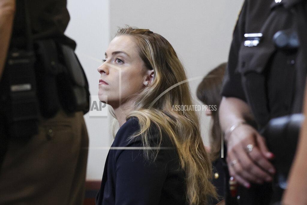 Evelyn Hockstein Whitney Henriquez, sister of actor Amber Heard, sits in the courtroom at the Fairfax County Circuit Courthouse in Fairfax, Va., Wednesday, May 25, 2022. Actor Johnny Depp sued his ex-wife Amber Heard for libel in Fairfax County Circuit Court after she wrote an op-ed piece in The Washington Post in 2018 referring to herself as a "public figure representing domestic abuse." (Evelyn Hockstein/Pool photo via AP)