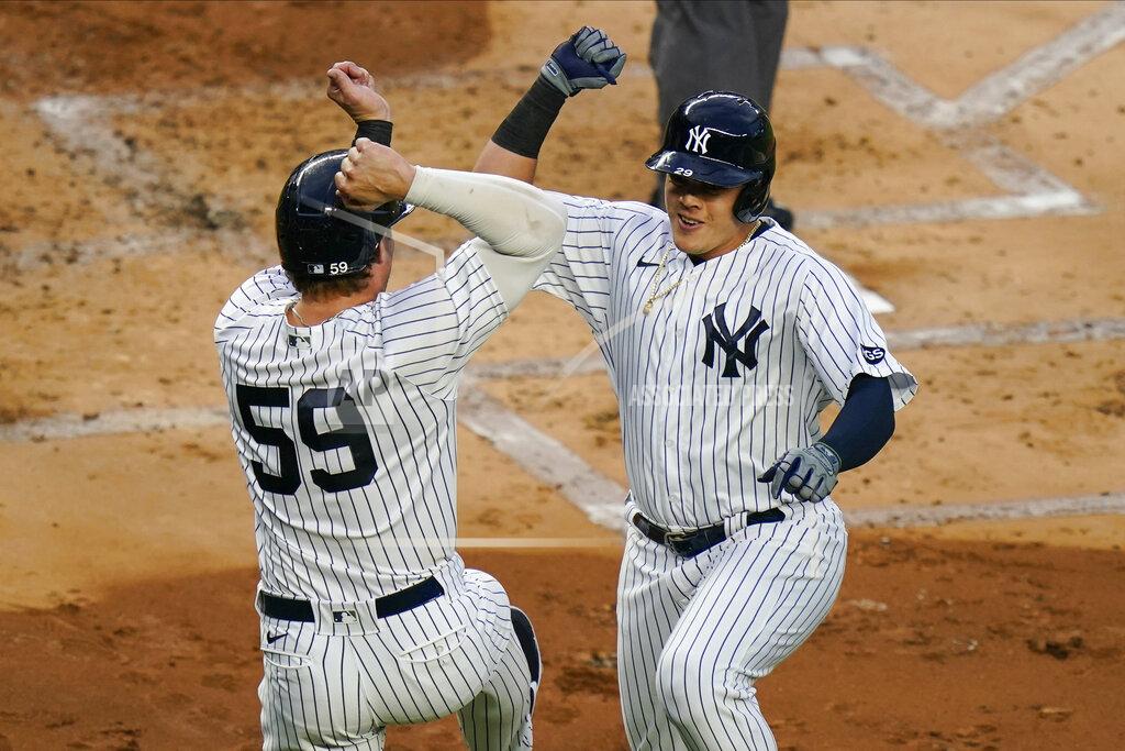 Frank Franklin Ii New York Yankees' Luke Voit (59) celebrates with Gio Urshela after they scored on a two-run home run by Urshela during the first inning of a baseball game against the Boston Red Sox Saturday, Aug. 15, 2020, in New York. (AP Photo/Frank Franklin II)