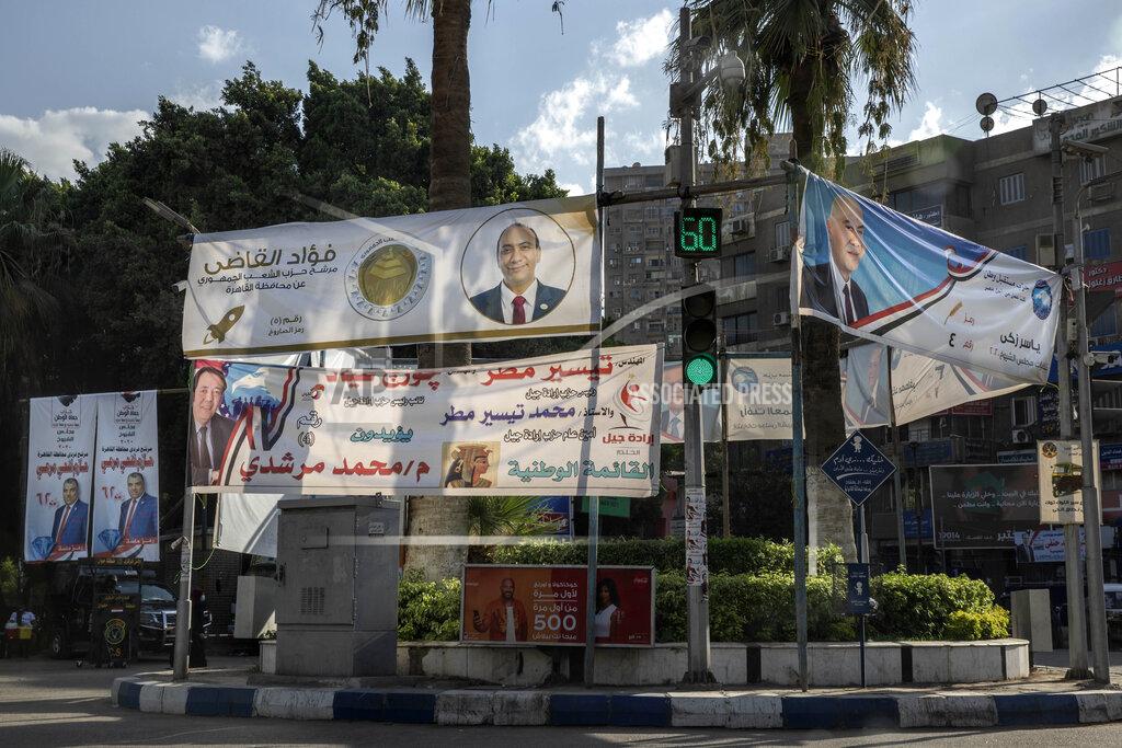 Nariman El-Mofty Election banners for candidates in the upper house of parliament are displayed on a street in Cairo, Egypt, Aug. 10, 2020. The elections will be held on Aug. 11 and 12. (AP Photo/Nariman El-Mofty)