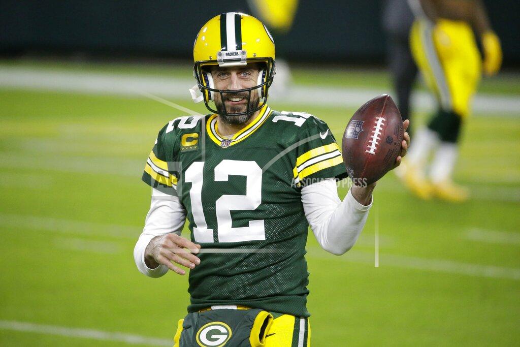 Mike Roemer Green Bay Packers' Aaron Rodgers warms up before an NFL football game against the Chicago Bears -Sunday, Nov. 29, 2020, in Green Bay, Wis. (AP Photo/Mike Roemer)