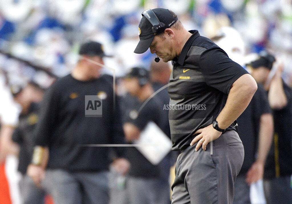 Phelan M. Ebenhack FILE - In this Nov. 3, 2018, file photo, Missouri head coach Barry Odom reacts on the sideline after a play during the second half of an NCAA college football game against Florida in Gainesville, Fla. Odom had every reason to believe Missouri's football program was finally on the right track. Then came Thursday's report from the NCAA's infractions committee. As punishment for academic misconduct involving a tutor that occurred while Odom was still getting his bearings in Columbia, the Tigers were hit with a postseason ban for the upcoming season. (AP Photo/Phelan M. Ebenhack, File)