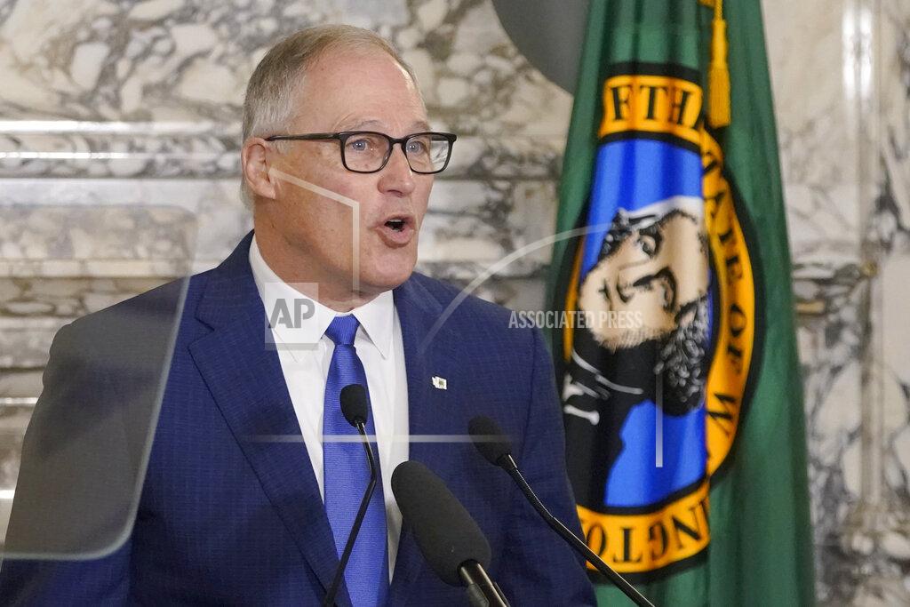 Ted S. Warren FILE - Washington Gov. Jay Inslee speaks on Jan. 11, 2022, at the Capitol in Olympia, Wash. Gov. Inslee has tested positive for COVID-19, his office said Wednesday, May 25, 2022, the same day state health officials urged people to wear face mask indoors as case counts steadily rise. (AP Photo/Ted S. Warren, File)