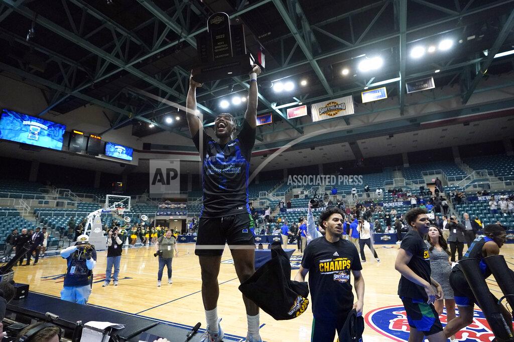 David J. Phillip Texas A&M Corpus Christi's Myles Smith celebrates after the Southland Conference tournament NCAA college basketball game final against the Southeastern Louisiana Saturday, March 12, 2022, in Katy, Texas. Texas A&M Corpus Christi won 73-65.(AP Photo/David J. Phillip)