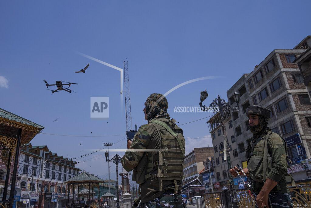 Dar Yasin Paramilitary soldiers keep vigil in an area with the help of a drone during a shutdown in central Srinagar, Indian controlled Kashmir, Wednesday, May 25, 2022. Shops and business establishment in some parts of Srinagar remained closed ahead of the sentence hearing of Kashmiri separatist leader Yasin Malik. Malik is being tried on charges of terrorist acts, raising funds, conspiracy, a member of a terrorist organization, and criminal conspiracy and sedition.(AP Photo/Dar Yasin)