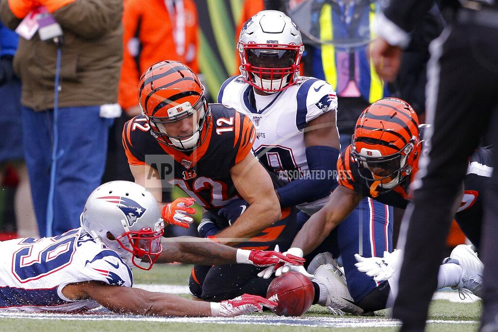 Gary Landers Cincinnati Bengals wide receiver Alex Erickson (12) fumbles a punt for a New England Patriots recovery in the first half of an NFL football game, Sunday, Dec. 15, 2019, in Cincinnati. (AP Photo/Gary Landers)
