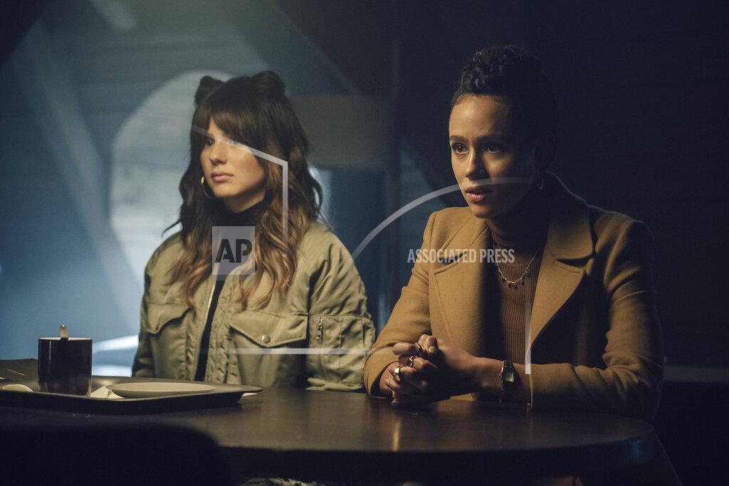 Stanislav Honzik This image released by Netflix shows Ruby O Fee, left, and Nathalie Emmanuel in "Army of Thieves." (Stanislav Honzik/Netflix via AP)