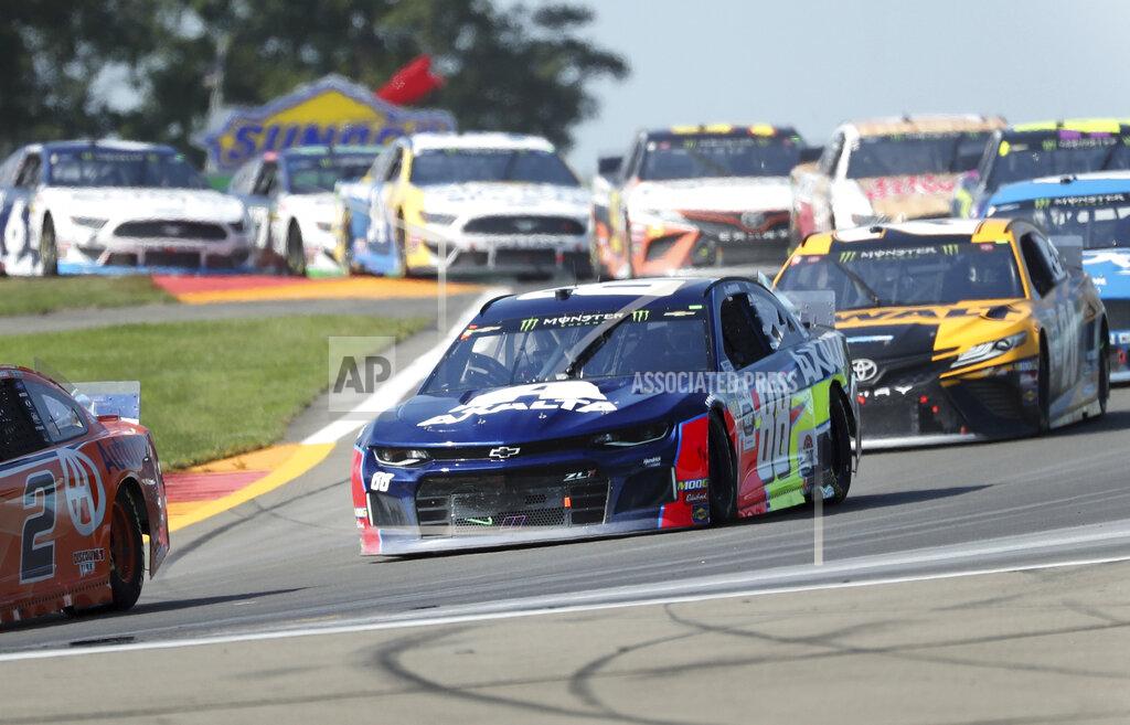 John Munson Alex Bowman (88) heads out of the Bus Stop during a NASCAR Cup Series auto race at Watkins Glen International, Sunday, Aug. 4, 2019, in Watkins Glen, N.Y. (AP Photo/John Munson)