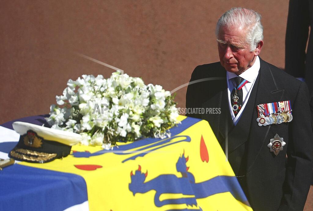 Hannah Mckay Prince Charles follows the coffin of his father Britain's Prince Philip during the funeral inside Windsor Castle in Windsor, England, Saturday, April 17, 2021. Prince Philip died April 9 at the age of 99 after 73 years of marriage to Britain's Queen Elizabeth II. (Hannah McKay/Pool via AP)