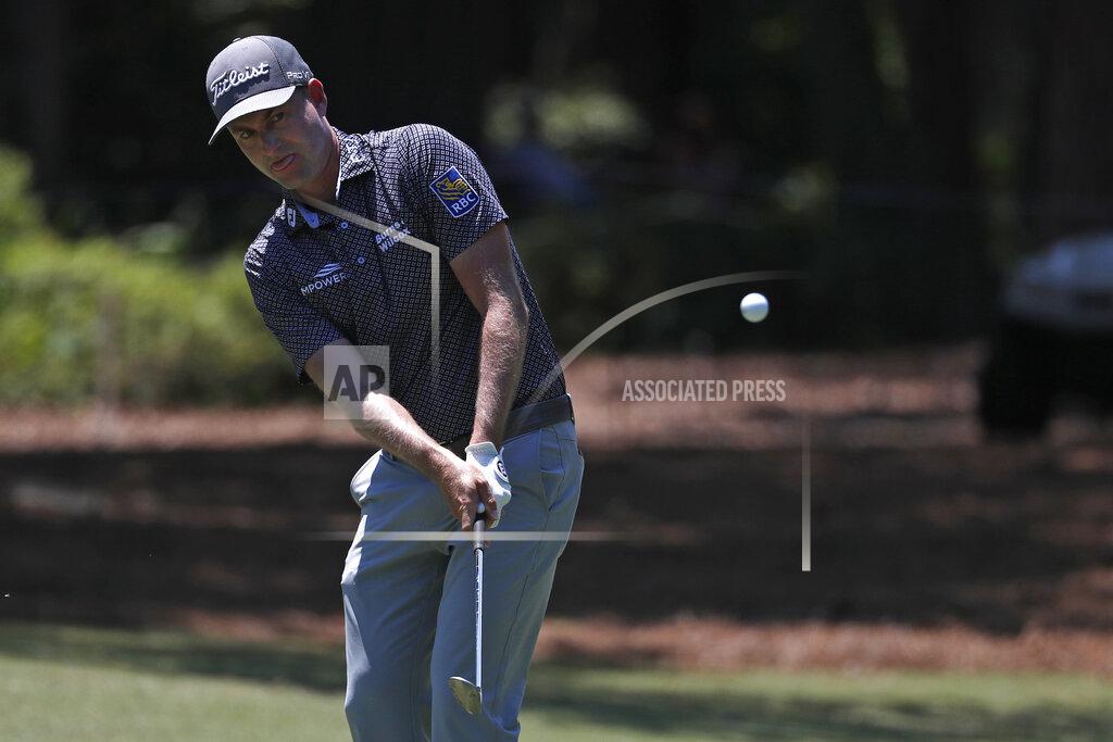 Gerry Broome Webb Simpson chips onto the first green during the third round of the RBC Heritage golf tournament, Saturday, June 20, 2020, in Hilton Head Island, S.C. (AP Photo/Gerry Broome)
