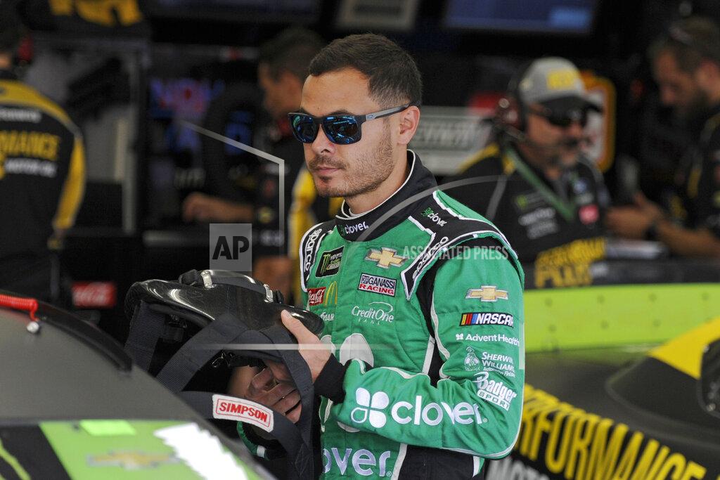 Mike Mccarn Kyle Larson waits in the garage during practice for Sunday's NASCAR Cup Series auto race at Charlotte Motor Speedway in Concord, N.C., Saturday, Sept. 28, 2019. (AP Photo/Mike McCarn)