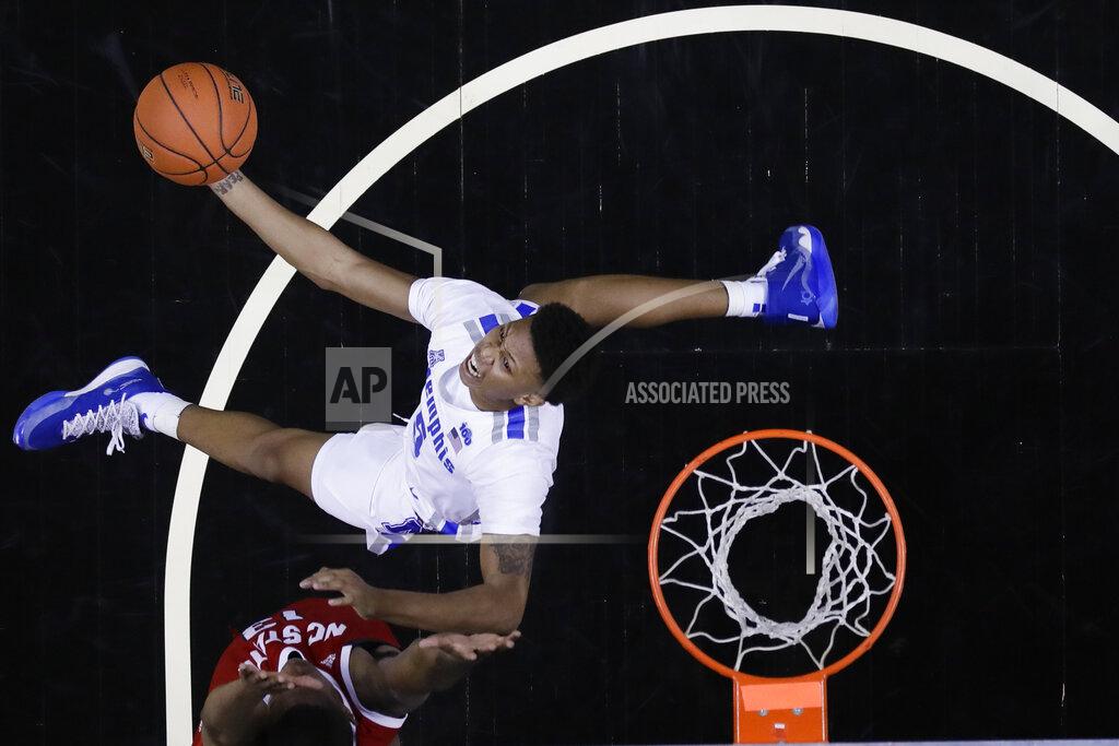Frank Franklin Ii Memphis' Boogie Ellis (5) shoots over North Carolina State's C.J. Bryce during the first half of an NCAA college basketball game in the Barclays Classic, Thursday, Nov. 28, 2019, in New York. (AP Photo/Frank Franklin II)