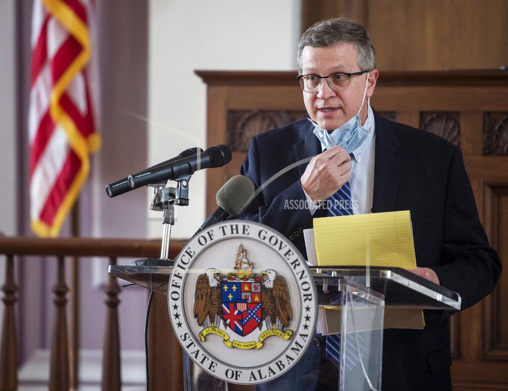Alabama's State Health Officer Scott Harris speaks at the State Capitol in Montgomery, Ala., on Friday, May 8, 2020. (Jake Crandall/The Montgomery Advertiser via AP)