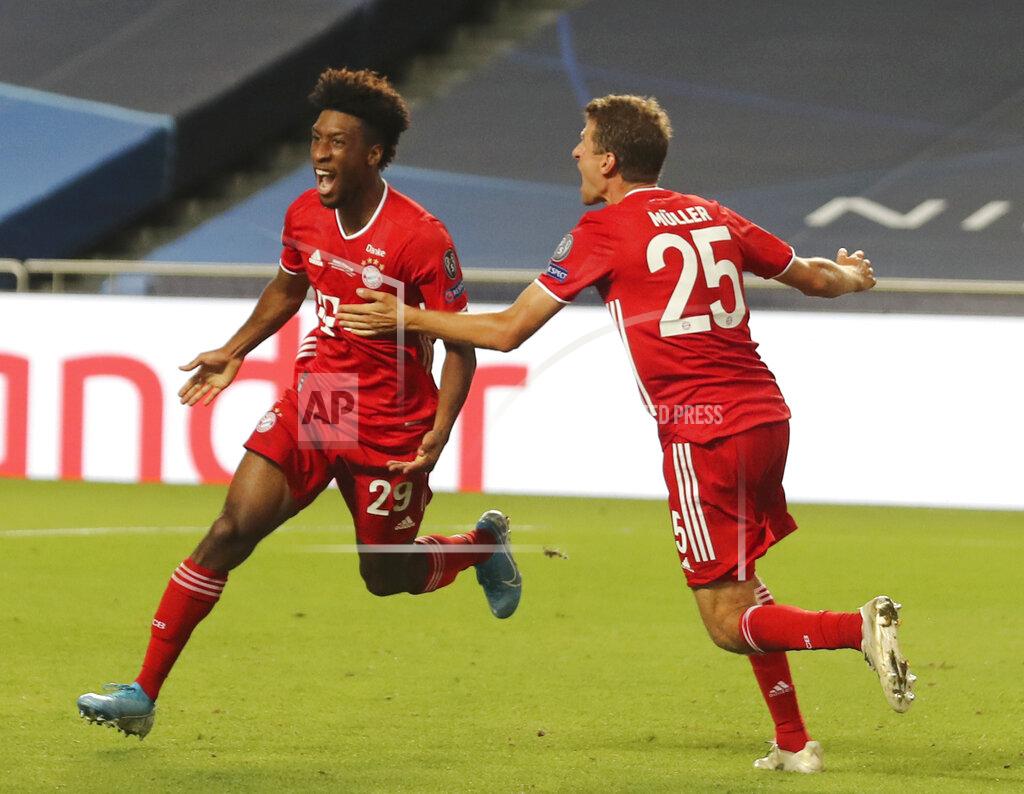Miguel A. Lopes Bayern's Kingsley Coman, left, celebrates with teammate Thomas Mueller after scoring his sides first goal during the Champions League final soccer match between Paris Saint-Germain and Bayern Munich at the Luz stadium in Lisbon, Portugal, Sunday, Aug. 23, 2020. (Miguel A. Lopes/Pool via AP)