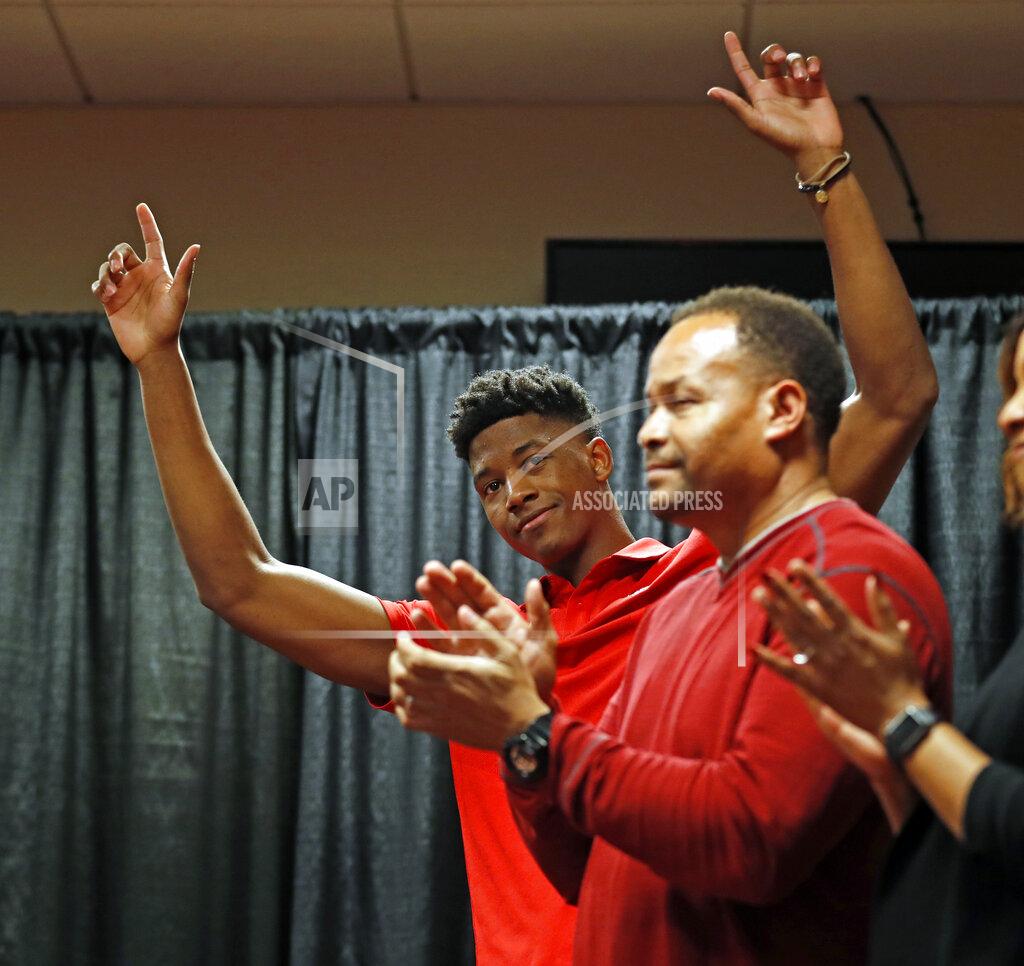 Brad Tollefson Texas Tech's Jarrett Culver, left, gestures after declaring to enter the NBA basketball draft while surrounded by his family during a news conference, Thursday, April 18, 2019, in Lubbock, Texas. (Brad Tollefson/Lubbock Avalanche-Journal via AP)