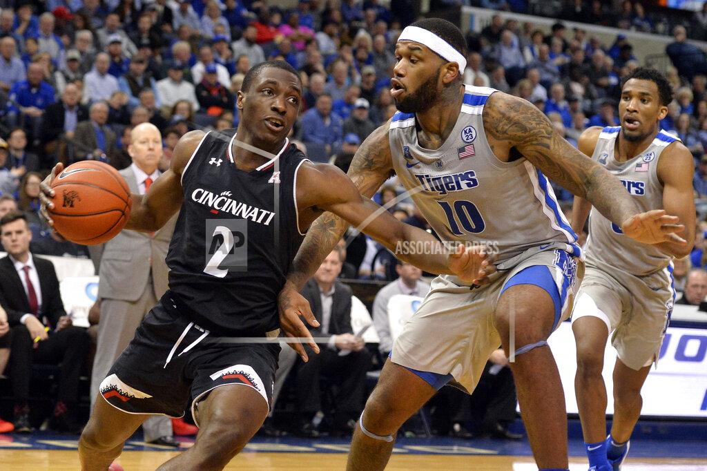 Brandon Dill Cincinnati guard Keith Williams (2) drives against Memphis forward Mike Parks Jr. (10) in the second half of an NCAA college basketball game Thursday, Feb. 7, 2019, in Memphis, Tenn. (AP Photo/Brandon Dill)