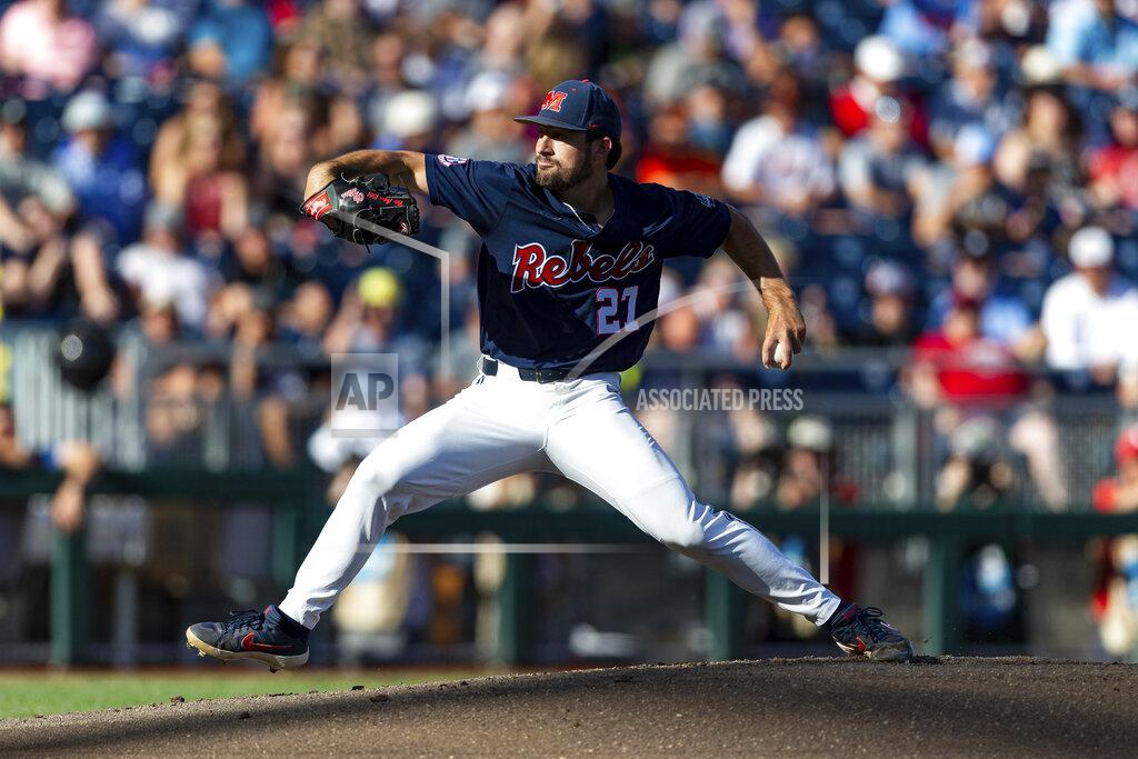 John Peterson Mississippi pitcher Drew McDaniel (21) throws against Arkansas in the first inning during an NCAA College World Series baseball game Wednesday, June 22, 2022, in Omaha, Neb. (AP Photo/John Peterson)