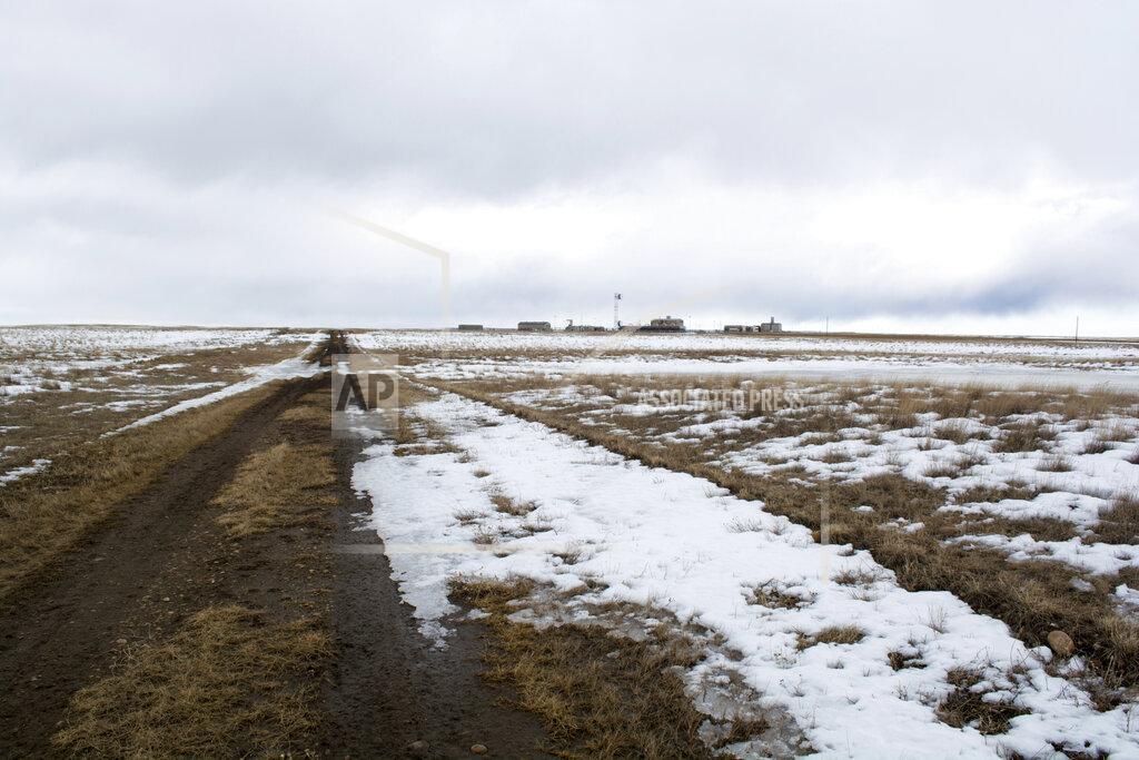 Al Nash This March 11, 2020 photo provided by the Bureau of Land Management shows the proposed route of the Keystone XL oil pipeline where it crosses into the U.S. from Canada in Phillips County, Montana. A Canadian company said Monday, April 6, 2020, that it's started construction on the long-stalled Keystone XL oil sands pipeline across the U.S.-Canada border, despite calls from tribal leaders and environmentalists to delay the $8 billion project amid the coronavirus pandemic. (Al Nash/Bureau of Land Management via AP)