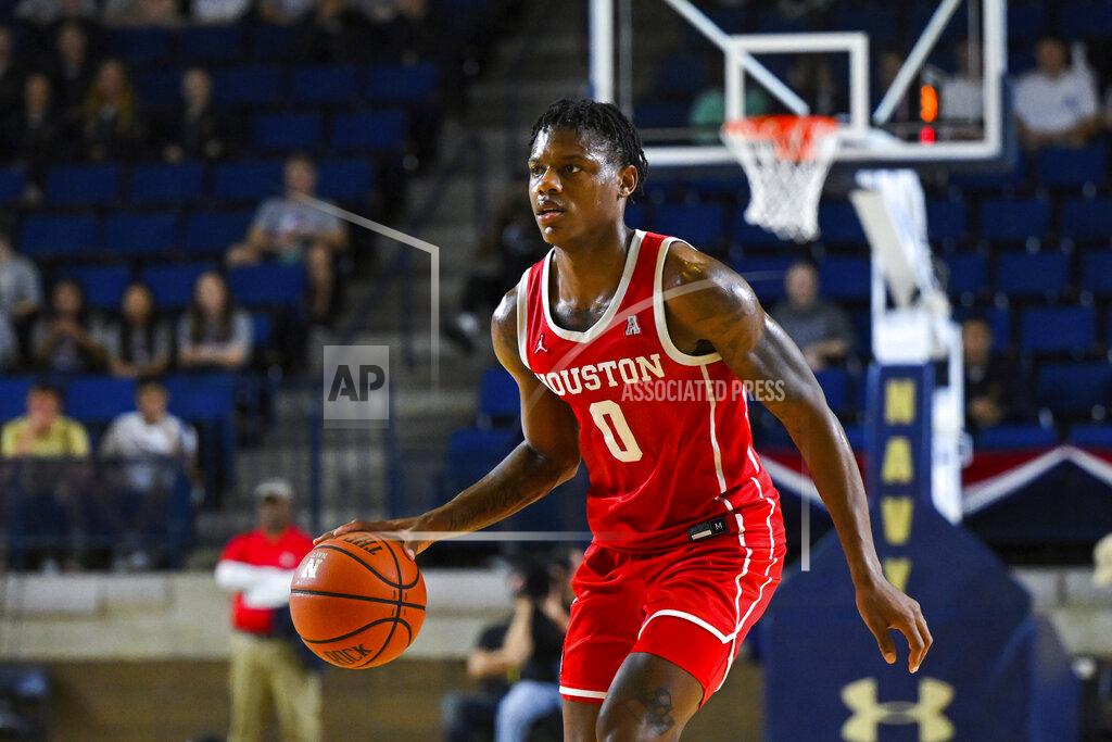 Terrance Williams Houston guard Marcus Sasser (0) brings the ball up during the second half of the team's NCAA college basketball game against Saint Joseph's at the Veterans Classic, Friday, Nov. 11, 2022, in Annapolis, Md. (AP Photo/Terrance Williams)