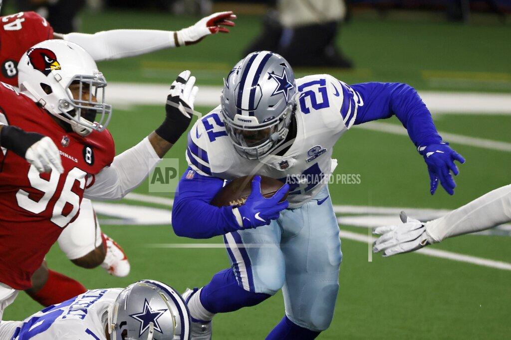 Ron Jenkins Arizona Cardinals defensive end Angelo Blackson (96) attempts to stop Dallas Cowboys running back Ezekiel Elliott (21) from gaining yardage on a run in the first half of an NFL football game in Arlington, Texas, Monday, Oct. 19, 2020. (AP Photo/Ron Jenkins)