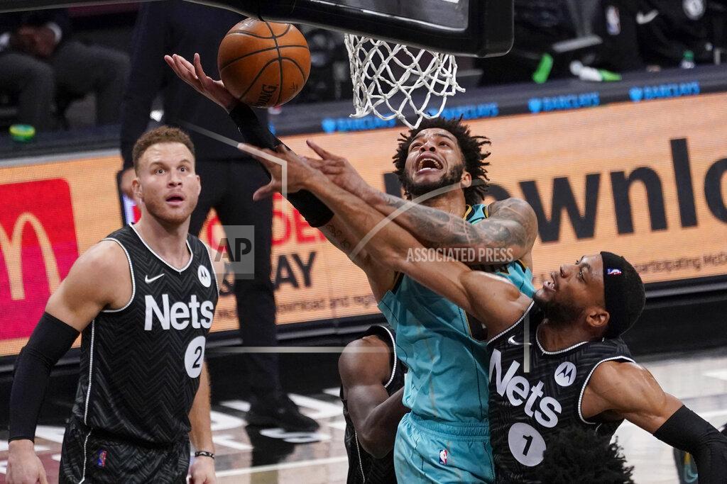 Mary Altaffer Brooklyn Nets forward Bruce Brown (1) stops Charlotte Hornets forward Miles Bridges from scoring during the second half of an NBA basketball game Friday, April 16, 2021, in New York. (AP Photo/Mary Altaffer)