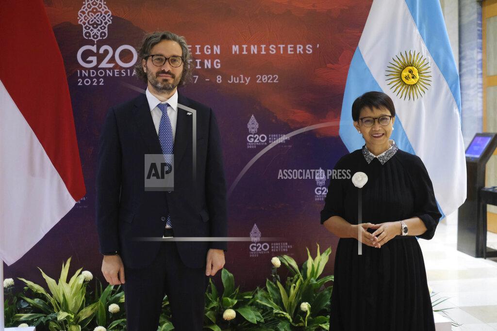 Uncredited In this photo released by Indonesian Ministry of Foreign Affairs, Argentine Foreign Minister Santiago Cafiero, left, poses for photographers with his Indonesian counterpart Retno Marsudi during their bilateral meeting ahead of the G20 Foreign Ministers' Meeting in Nusa Dua, Bali, Indonesia, Wednesday, July 6, 2022. Foreign ministers from the Group of 20 leading rich and developing nations are gathering in Indonesia's resort island of Bali for talks bound to be dominated by the conflict in Ukraine despite an agenda focused on global cooperation and food and energy security. (Indonesian Ministry of Foreign Affairs via AP)