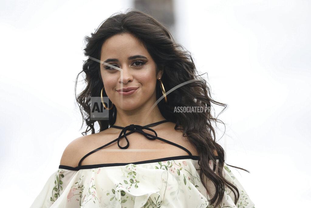 Vianney Le Caer FILE - Camila Cabello appears at the L'Oreal Spring-Summer 2022 ready-to-wear fashion show presented in Paris, on Oct. 3, 2021. Cabello will join “The Voice” singing contest as a coach. The pop star's hit singles include “Havana,” and she starred in the 2021 film musical “Cinderella.” She'll join returning coaches John Legend, Blake Shelton and Gwen Stefani. (Photo by Vianney Le Caer/Invision/AP, File)