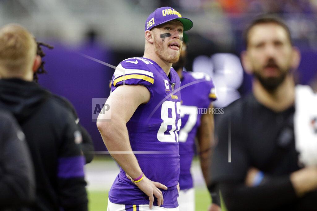 Andy Clayton-King FILE - In this Dec. 29, 2019, file photo, Minnesota Vikings tight end Kyle Rudolph stands on the sidelines during the first half of an NFL football game against the Chicago Bears, in Minneapolis. In his ninth season with the Minnesota Vikings, tight end Kyle Rudolph realizes he doesn't have many more of these chances to win a championship. The Vikings start the playoffs at New Orleans on Sunday, Jan. 5, 2020. (AP Photo/Andy Clayton-King, File)