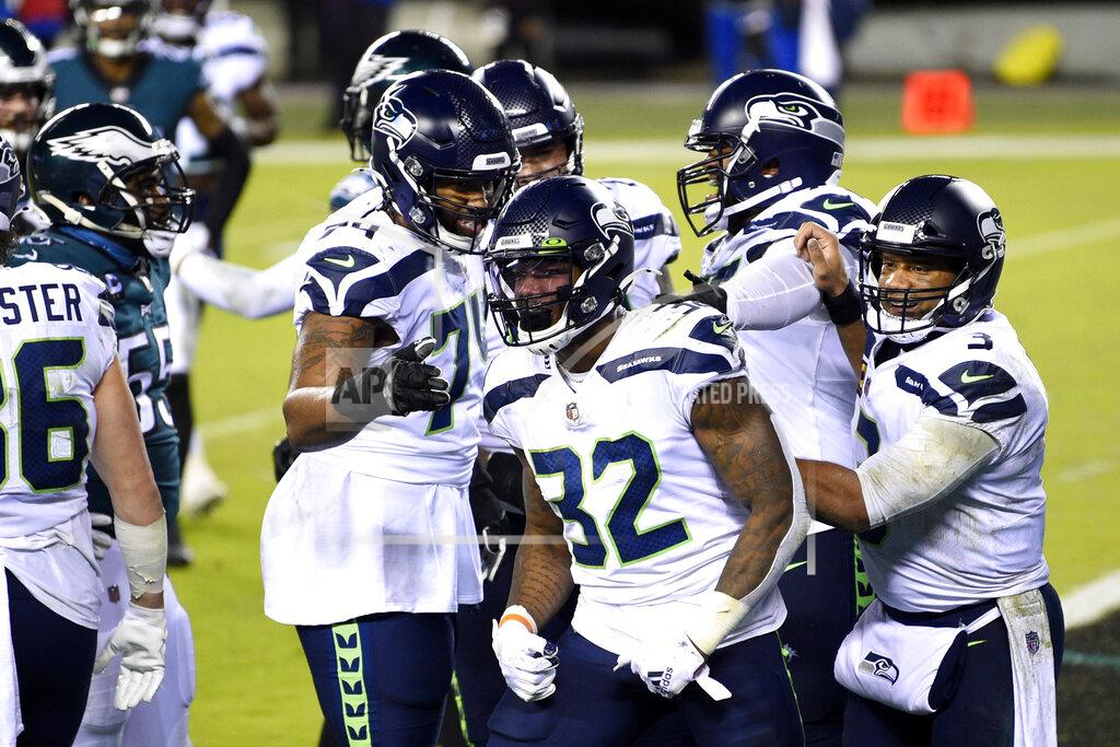 Derik Hamilton Seattle Seahawks' Chris Carson reacts after scoring a touchdown during the first half of an NFL football game against the Philadelphia Eagles, Monday, Nov. 30, 2020, in Philadelphia. (AP Photo/Derik Hamilton)