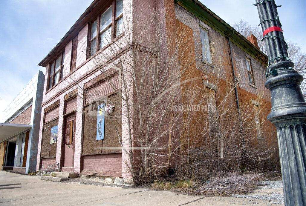 Eddie Moore This Tuesday, April 27, 2021 photo shows downtown Raton, N.M. Vacant buildings — some dilapidated and others that look recently abandoned — have become an unavoidable reality in Raton, a constant reminder to residents of their town’s current plight. (Eddie Moore /The Albuquerque Journal via AP)