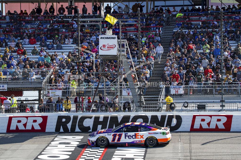 Mike Caudill NASCAR Cup Series driver Denny Hamlin (11) completes lap 35 in stage 1 of the Toyota Owners 400 NASCAR Cup Series race at Richmond Raceway on Sunday, April 3, 2022 in Richmond, Va. (AP Photo/Mike Caudill)