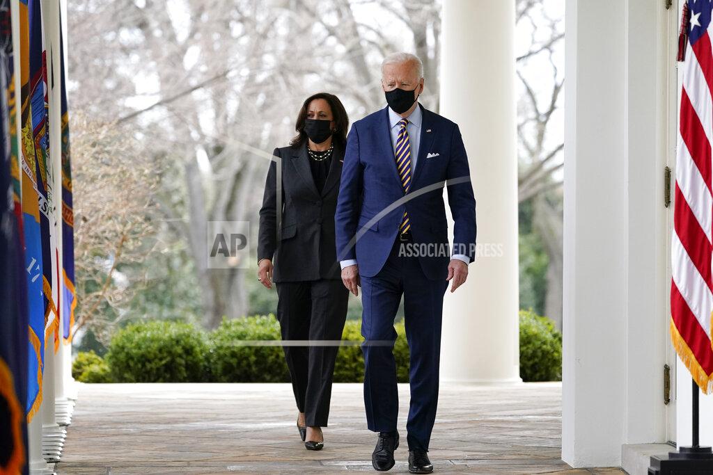 Alex Brandon FILE - In this March 12, 2021, file photo, President Joe Biden and Vice President Kamala Harris walk along the White House colonnade as they arrive to speak in the Rose Garden in Washington. Biden and Harris plan to meet with Asian American community leaders in Georgia in the wake of the deadly shootings at three Atlanta-area massage parlors, the White House announced Thursday, March 18. (AP Photo/Alex Brandon, File)