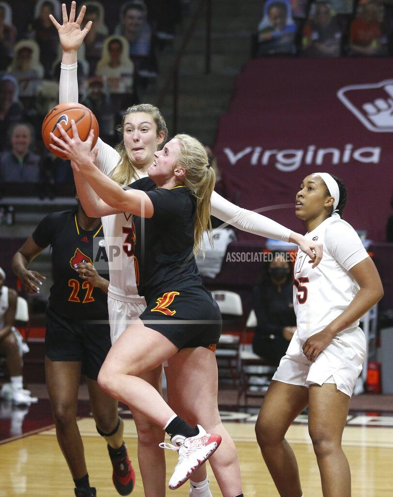 Matt Gentry Louisville's Hailey Van Lith scores past Virginia Tech defenders Elizabeth Kitley and Azana Baines (15) during the first half of an NCAA college basketball game Thursday, Jan. 7, 2021, in Blacksburg, Va. (Matt Gentry/The Roanoke Times via AP, Pool)