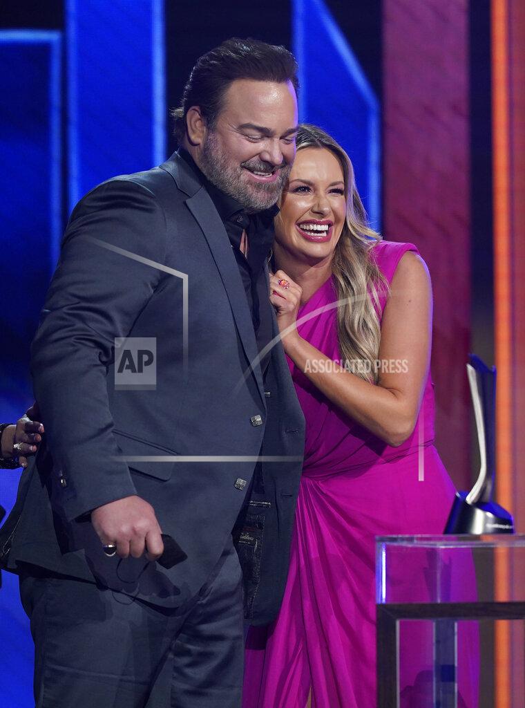 Mark Humphrey Lee Brice, left, and Carly Pearce accept the award for single of the year for "I Hope You're Happy Now" at the 56th annual Academy of Country Music Awards on Sunday, April 18, 2021, at the Grand Ole Opry in Nashville, Tenn. (AP Photo/Mark Humphrey)