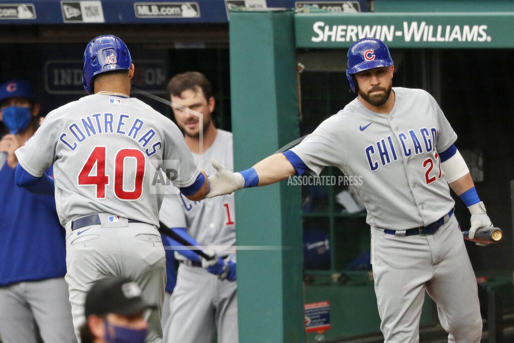 Tony Dejak Chicago Cubs' Willson Contreras (40) is congratulated by Jason Kipnis (27) after Contreras scored in the second inning in a baseball game against the Cleveland Indians, Tuesday, Aug. 11, 2020, in Cleveland. (AP Photo/Tony Dejak)