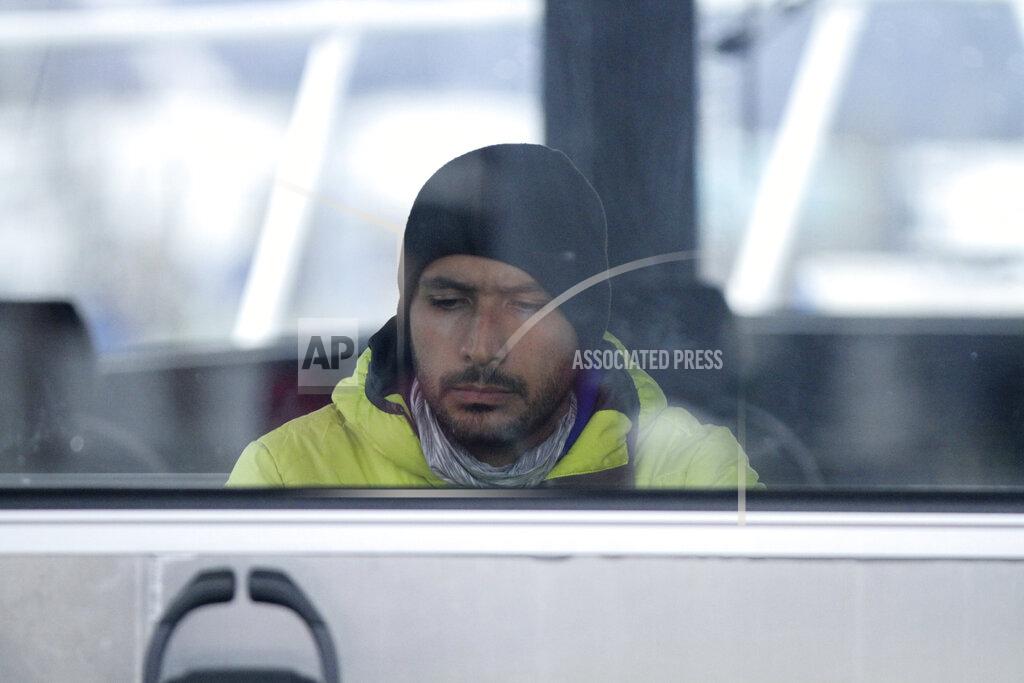 Mark Thiessen This May 3, 2022, photo shows engineer Ehsan Abdi checking data on his computer after the University of Alaska Fairbanks research vessel Nanuq returned to dock in Seward, Alaska. The data was from a special sensor which Abdi helped fit to an underwater glider to study ocean acidification. (AP Photo/Mark Thiessen)