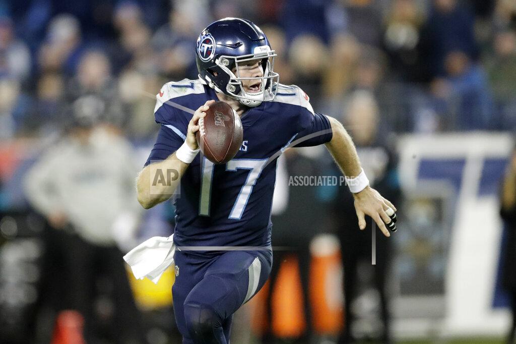James Kenney Tennessee Titans quarterback Ryan Tannehill runs 3 yards for a touchdown against the Jacksonville Jaguars in the second half of an NFL football game Sunday, Nov. 24, 2019, in Nashville, Tenn. (AP Photo/James Kenney)