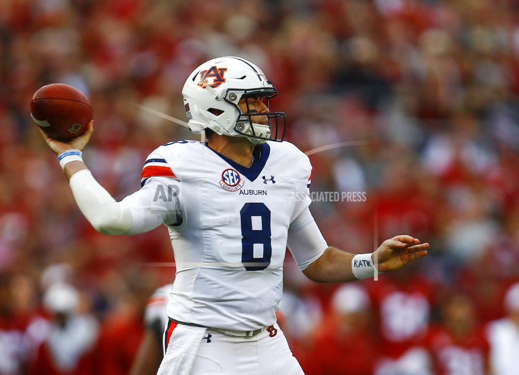 Butch Dill File-This Nov. 24, 2018, file photo shows Auburn quarterback Jarrett Stidham (8) throwing a pass against Alabama during the first half of an NCAA college football game in Tuscaloosa, Ala. he Purdue Boilermakers can finish off a season where their biggest win might just be keeping Jeff Brohm as coach in the Music City Bowl, while Auburn at least has Stidham playing one last game Friday, Dec. 28, 2018, before leaving for the NFL draft.(AP Photo/Butch Dill, File)