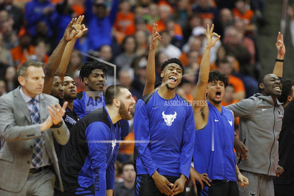 Nick Lisi FILE - In this Tuesday, Dec. 18, 2018, file photo, Buffalo players on the bench celebrate late in the second half of an NCAA college basketball game against Syracuse in Syracuse, N.Y., as Buffalo went on to win 71-59. Buffalo is off to its best start in school history. (AP Photo/Nick Lisi, File)