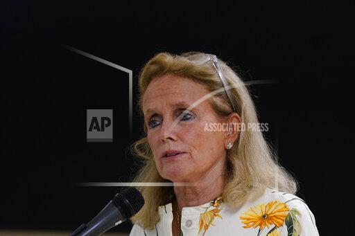 FILE - U.S. Rep. Debbie Dingell, D-Mich., addresses the media during a visit to the Water Resource Recovery Facility, July 8, 2021, in Detroit. A suburban Detroit office of Dingell's has been broken into and ransacked, with memorabilia belonging to her late husband and longtime Congressman John Dingell damaged. Dingell reported the break-in at the office in Dearborn on Monday, Nov. 29, 2021 and said it was being investigated by local and U.S. Capitol police. (AP Photo/Carlos Osorio, file)
