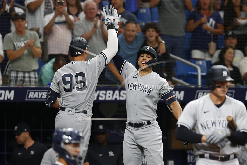 Scott Audette New York Yankees' Aaron Judge, left, celebrates with Giancarlo Stanton after hitting a home run against the Tampa Bay Rays during the fourth inning of a baseball game Wednesday, June 22, 2022, in St. Petersburg, Fla. (AP Photo/Scott Audette)